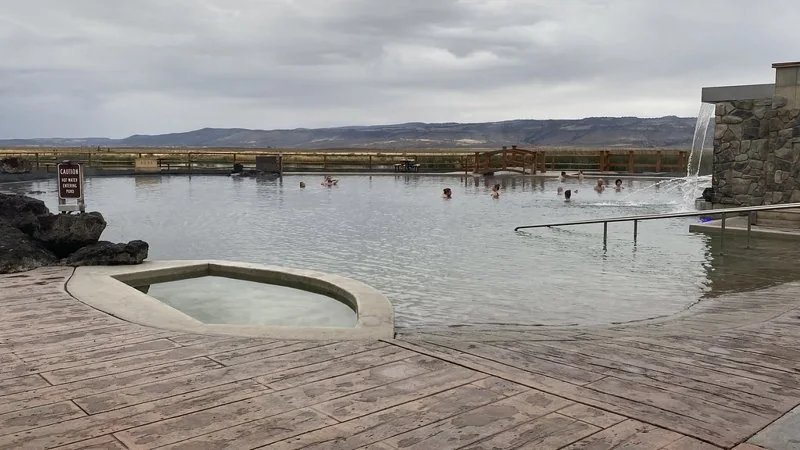Outdoor mineral-water pond and deck at Crane Hot Springs (archive photograph)