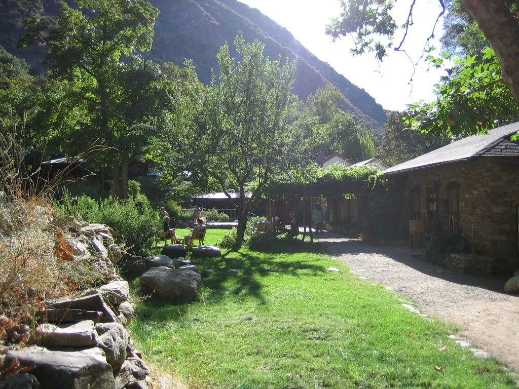 The lawn and sitting area beside the office at Tassajara Zen Mountain Center in a photograph taken in August 2005